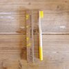 U brand toothbrush, yellow